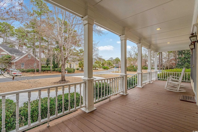 wooden deck featuring covered porch