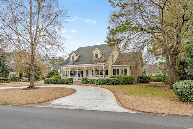 cape cod house with covered porch