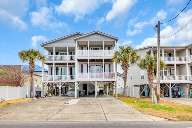 coastal home featuring a carport