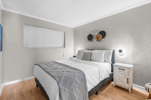 bedroom featuring crown molding, hardwood / wood-style floors, and a textured ceiling