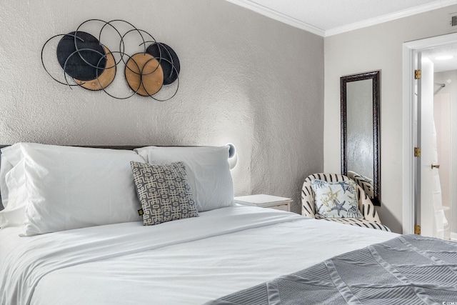 bedroom with crown molding