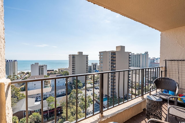 balcony featuring a water view