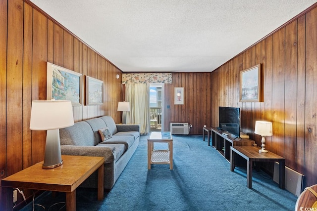 carpeted living room with a textured ceiling