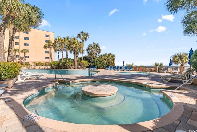 1105 S Ocean Blvd Unit 1134, Myrtle Beach, SC 29577 - view of pool featuring a patio