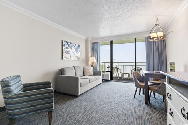 1105 S Ocean Blvd Unit 1134, Myrtle Beach, SC 29577 - living room with dark colored carpet, ornamental molding, floor to ceiling windows, and a textured ceiling