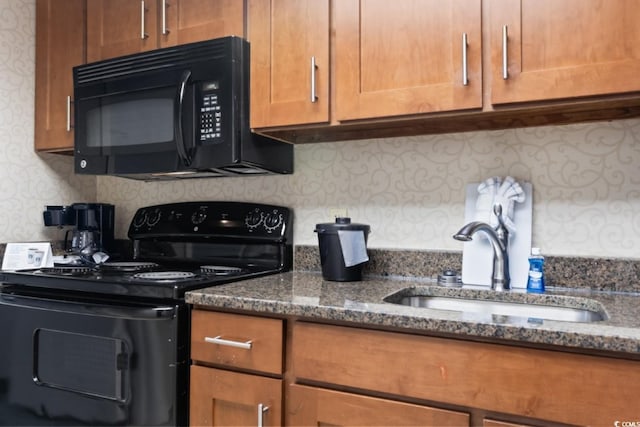 1105 S Ocean Blvd Unit 1134, Myrtle Beach, SC 29577 - kitchen with tasteful backsplash, sink, black appliances, and dark stone counters