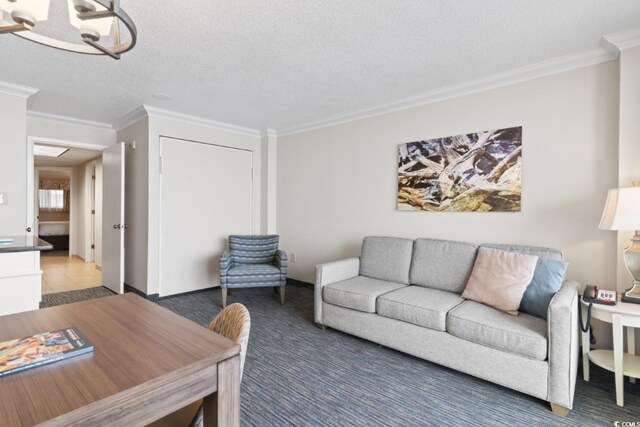 1105 S Ocean Blvd Unit 1134, Myrtle Beach, SC 29577 - living room with crown molding, carpet, an inviting chandelier, and a textured ceiling