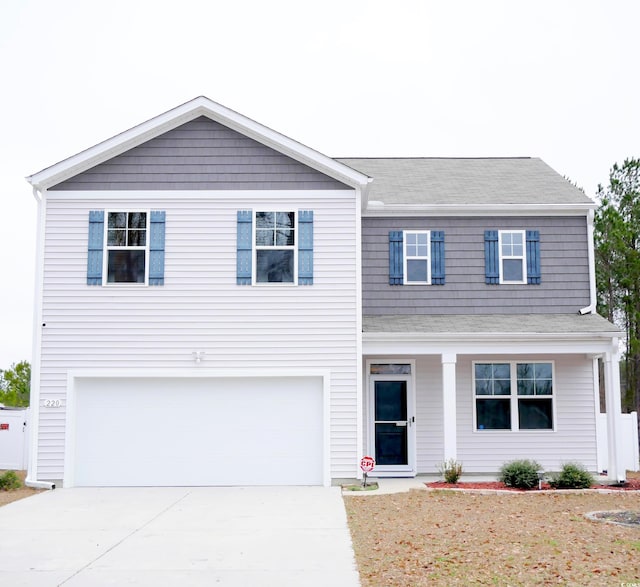 view of front facade featuring a garage