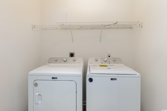 130 Lazy Willow Ln Unit 204, Myrtle Beach, SC 29588 - laundry area with separate washer and dryer and laundry area