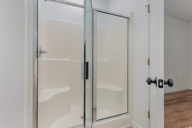 130 Lazy Willow Ln Unit 204, Myrtle Beach, SC 29588 - full bath featuring a shower stall, baseboards, and wood finished floors