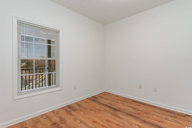 130 Lazy Willow Ln Unit 204, Myrtle Beach, SC 29588 - spare room featuring baseboards and light wood-style floors