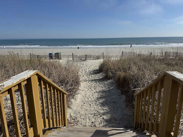 property view of water featuring a view of the beach