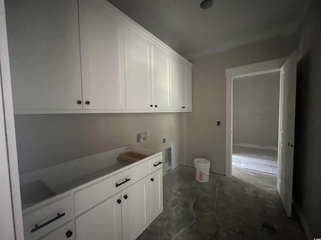 laundry room featuring cabinet space, hookup for a washing machine, and hookup for an electric dryer