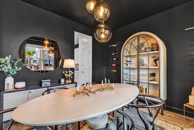 dining room featuring light hardwood / wood-style flooring