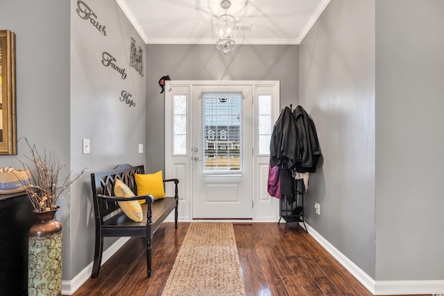 entryway with ornamental molding, dark wood finished floors, and baseboards