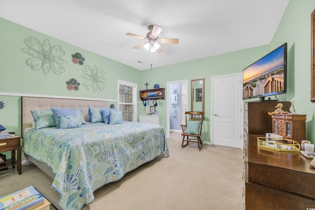 bedroom with a ceiling fan, baseboards, and carpet flooring