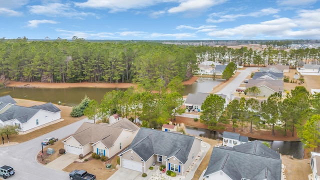 aerial view featuring a water view and a residential view