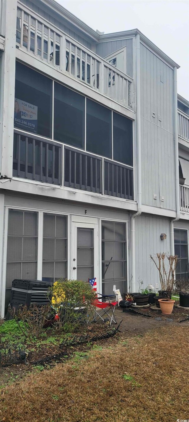 3700 Golf Colony Dr Unit 26G, Little River, SC 29566 - back of house with a balcony