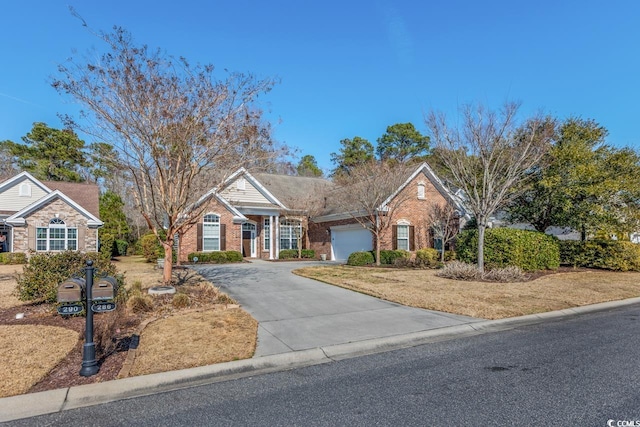 view of front of property with a garage