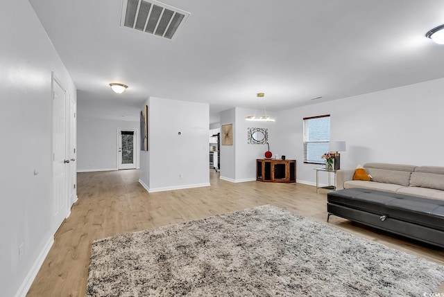 145 Bendick Ct, Little River, SC 29566 - living area featuring light wood-type flooring, baseboards, and visible vents