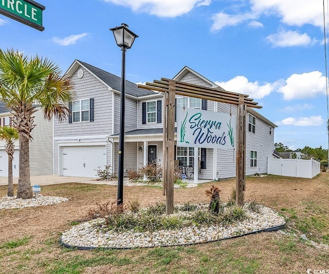 145 Bendick Ct, Little River, SC 29566 - view of front of house featuring a garage and fence
