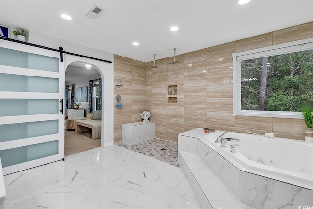 145 Bendick Ct, Little River, SC 29566 - bathroom featuring recessed lighting, tiled shower, visible vents, marble finish floor, and a tub with jets