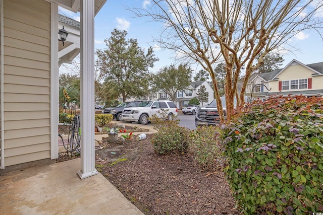 view of yard featuring a residential view