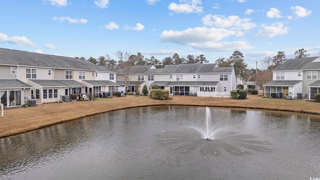 view of water feature with a residential view