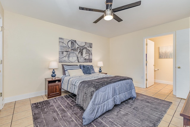 tiled bedroom with ceiling fan