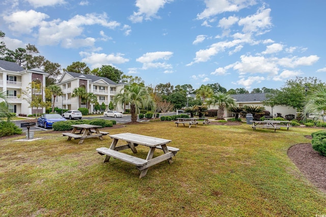 view of community with a yard