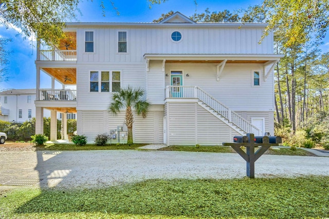 view of front of house with a balcony