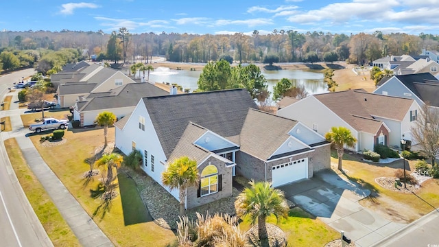 aerial view with a residential view and a water view