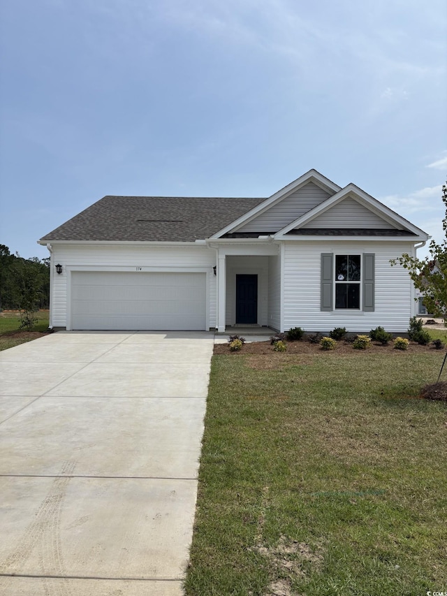 174 Glengrove Ln, Murrells Inlet, SC 29576 - ranch-style home featuring driveway, a garage, a front yard, and a shingled roof