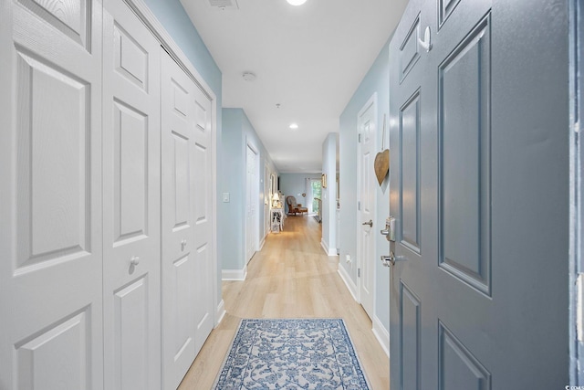 hall featuring light hardwood / wood-style flooring