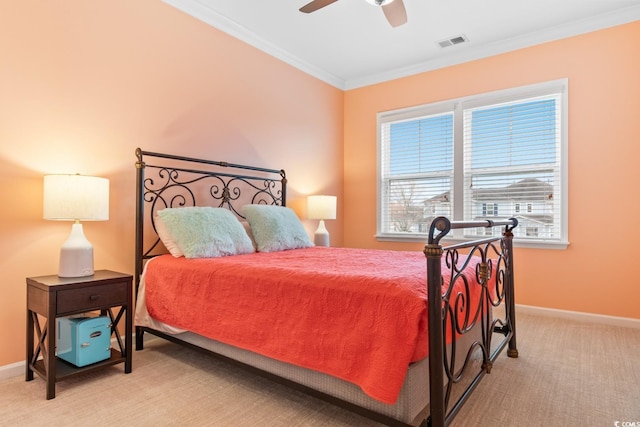 bedroom with light carpet, baseboards, visible vents, ceiling fan, and crown molding