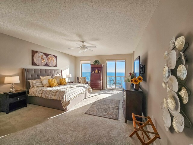 8500 Margate Cir Unit 1604, Myrtle Beach, SC 29572 - bedroom with a textured ceiling, carpet, ceiling fan, and access to outside