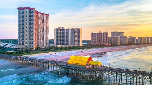 8500 Margate Cir Unit 1604, Myrtle Beach, SC 29572 - aerial view featuring a pier, a water view, a city view, and a beach view
