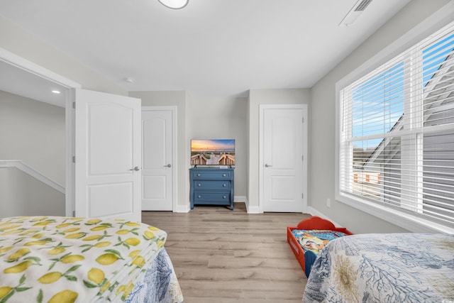 bedroom featuring light wood-type flooring