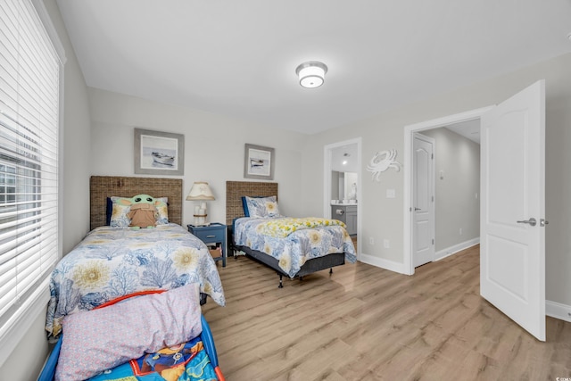 bedroom with light hardwood / wood-style flooring