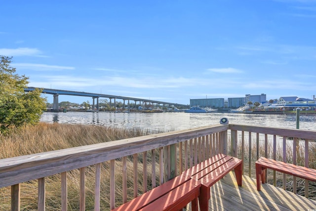 wooden terrace with a water view