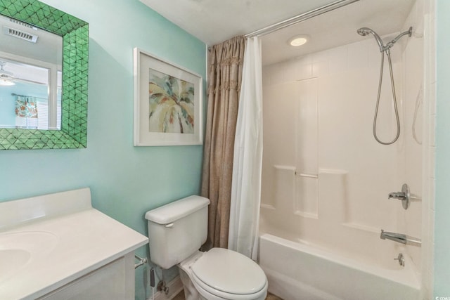 full bathroom featuring vanity, toilet, shower / bathtub combination with curtain, and visible vents