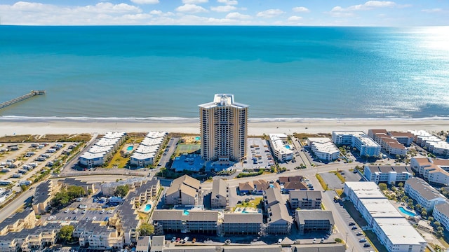 aerial view featuring a beach view and a water view