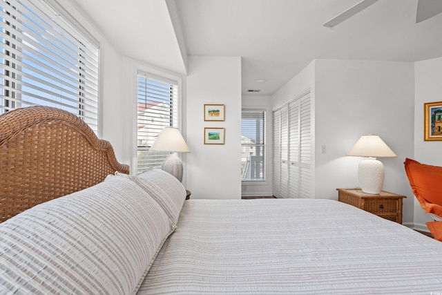 bedroom with a closet and ceiling fan