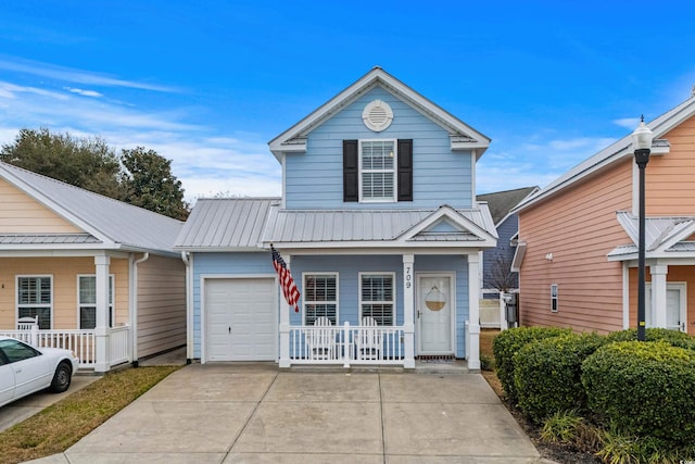 view of front property with a garage and covered porch