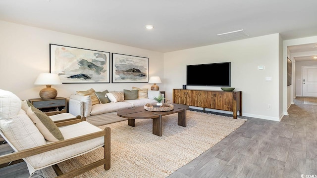 living room with hardwood / wood-style flooring