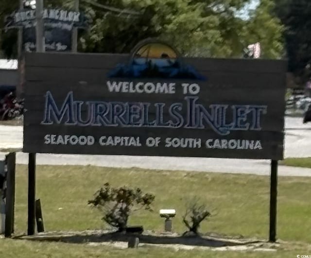 view of community sign
