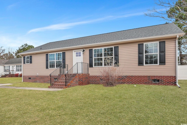 view of front of home featuring a front yard, crawl space, and roof with shingles