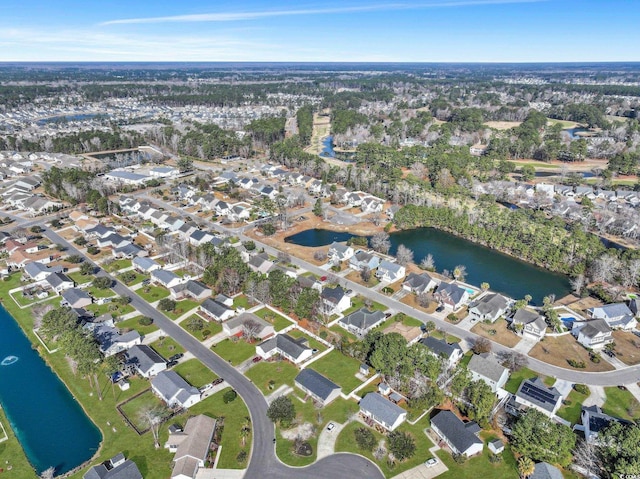 aerial view with a water view and a residential view