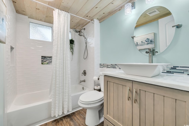 full bathroom featuring wood-type flooring, sink, wood ceiling, toilet, and shower / bathtub combination with curtain