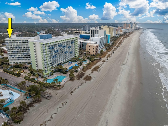 aerial view featuring a water view and a view of the beach